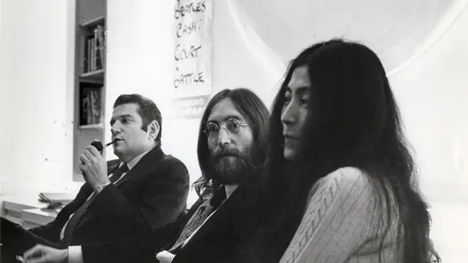 Allen Klein with John and Yoko, negotiates over the purchase of The Beatles' song publishing. This does not end well.