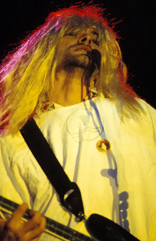 Kurt and his prank wig at the start of Nirvana's Reading headline set in 1992