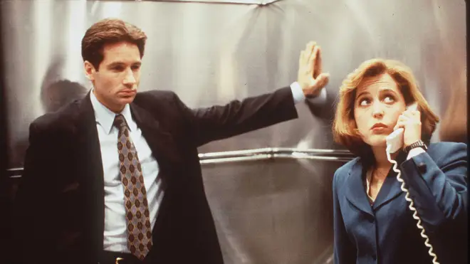 David Duchovny and Gillian Anderson in The X-Files, 1996