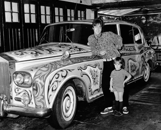 John Lennon and his son Julian at their house in Weybridge, Surrey in late 1967