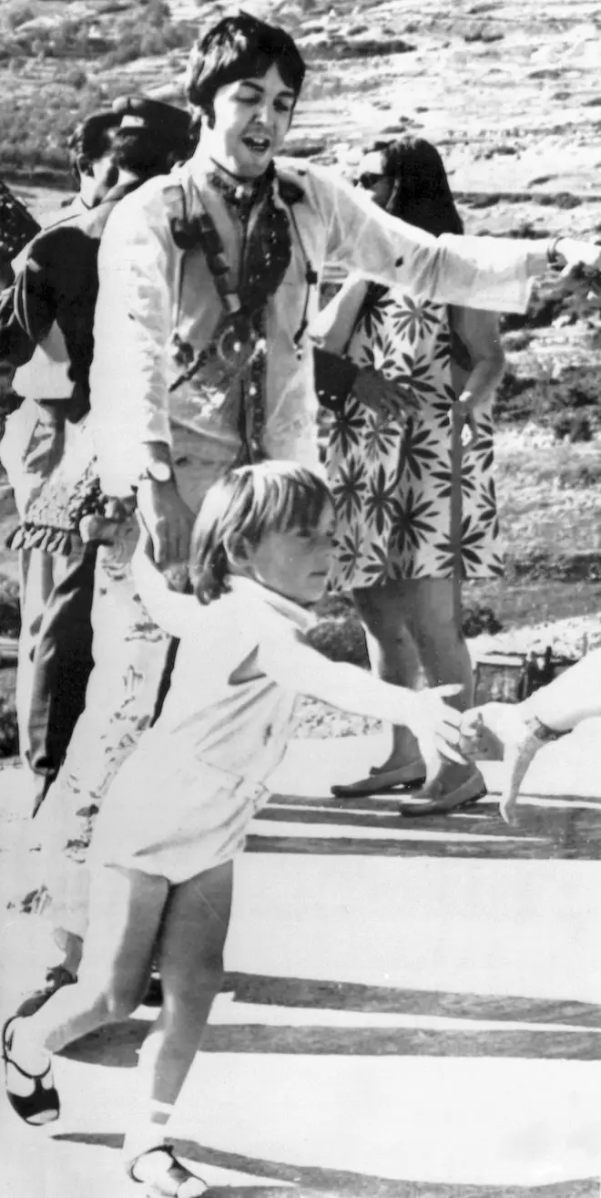 Paul McCartney with Julian Lennon in Greece, 26th July 1967
