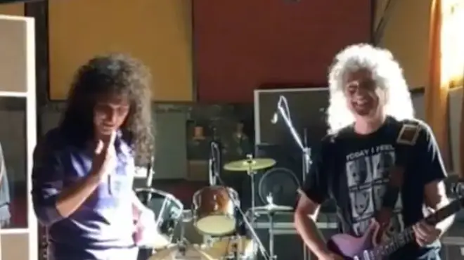 Screenshot of a video shared by Queen guitarist Brian May playing the solo to Bohemian Rhapsody on the set of the Bohemian Rhapsody film