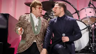 Elton John and Taron Egerton perform Tiny Dancer at his Oscars viewing party