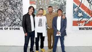 The Stone Roses' John Squire and Gary 'Mani' Mounfield with Daniel Kearns and David Beckham at the Kent & Curwen show during London Fashion Week Men's June 2018