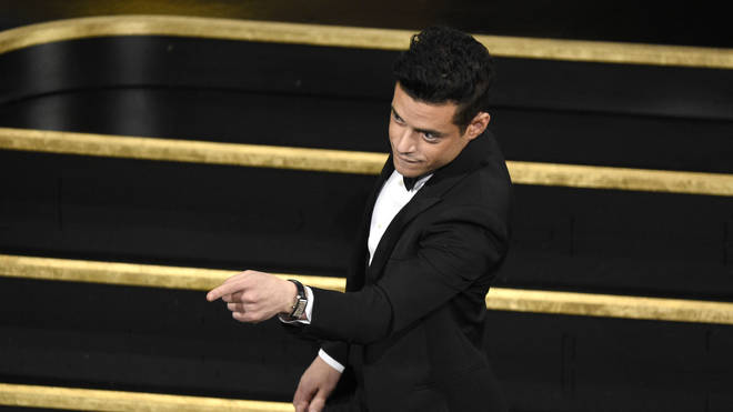 Rami Malek walks up to accept the award for best actor at the Oscars in 2019
