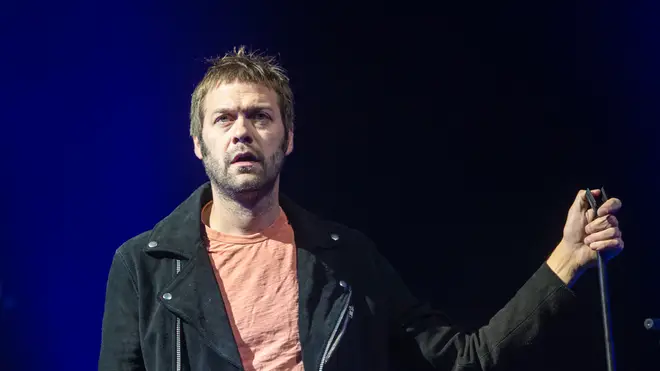 Kasabian's Tom Meighan on stage at Princes Street Gardens during Edinburgh Summer Sessions 2018