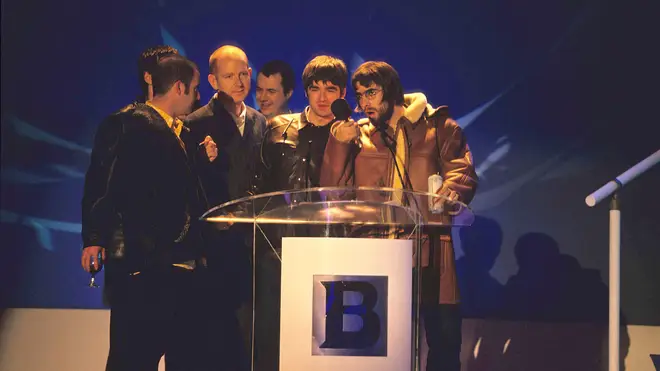 Alan McGee and Oasis at the BRIT awards in 1996