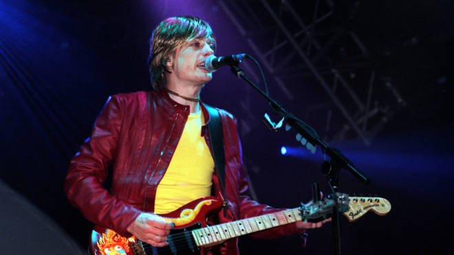 Crispian Mills from Kula Shaker performs on stage during the 1999 Glastonbury Festival.