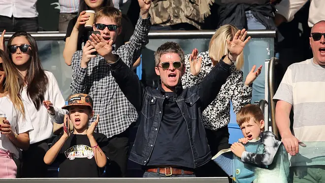 Noel Gallagher a fan of Manchester City,  celebrates becoming champions after the Premier League match between Brighton & Hove Albion and Manchester City