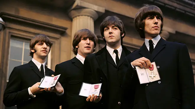 The Beatles receive their MBEs in 1965