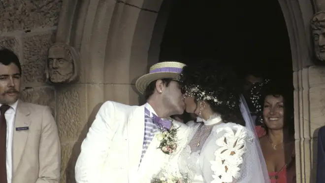 Elton John and ex-wife Renate kiss outside church on wedding day