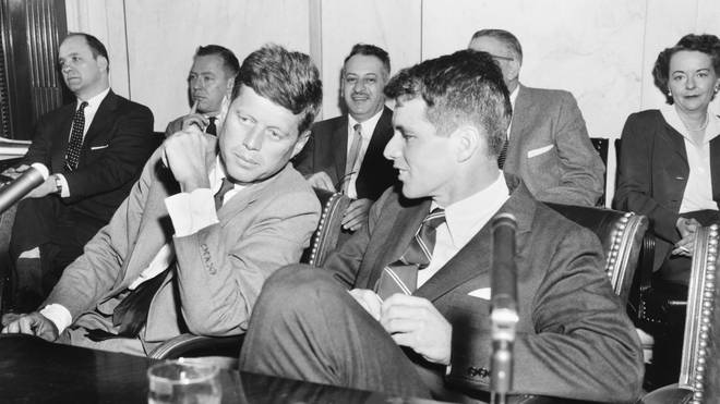 John F. Kennedy and his brother Robert F. Kennedy in 1957. Both brothers would be assassinated.