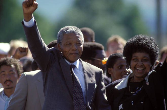 Nelson Mandela is finally freed. He's pictured with his wife Winnie, on 11th February 1990