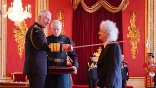 King Charles III knights Sir Brian May at Buckingham Palace