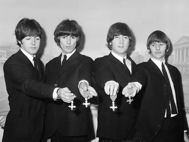 26th October 1965: The Beatles show off their MBEs at the Saville Theatre, London
