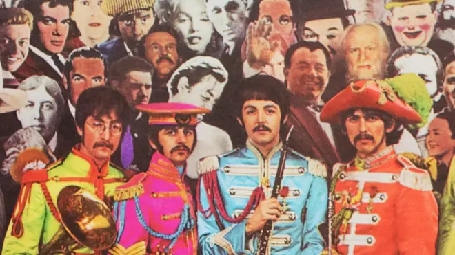 The Beatles - Sgt Pepper&squot;s Lonely Hearts Club Band album cover. Note the hand "over" Paul&squot;s head.