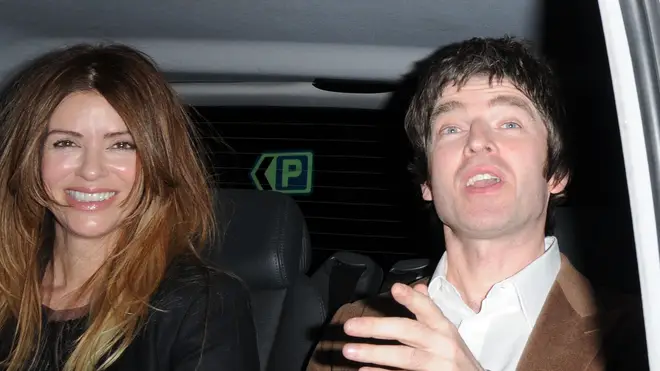 Always the passenger: Noel pictured with wife Sara in the back of acab in 2010