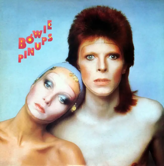 Model Twiggy poses with David Bowie in Paris for the cover of his Pin Ups album, 1973.