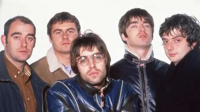 The 1996 line-up of Oasis: Paul "Bonehead" Arthurs, Alan White, Liam Gallagher, Noel Gallagher, Paul "Guigsy" McGuigan