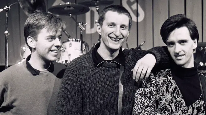 Andy Rourke and Johnny Marr join Billy Bragg (centre) on the Red Wedge tour in January 1986.