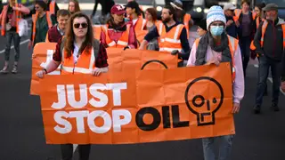 Just Stop Oil climate activists slow march along Whitehall in central London on May 11, 2023