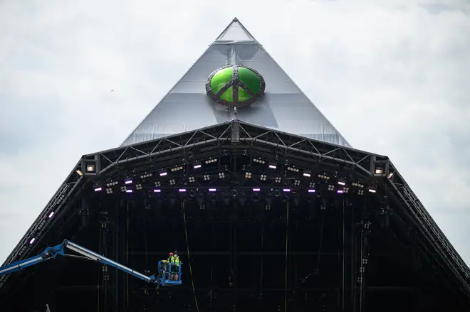 Members of the technical crew work on the Pyramid Stage after the gates open to the public on Day 1 of Glastonbury Festival 2023 on June 21, 2023