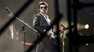 Alex Turner performing with Arctic Monkeys at Glastonbury 2023