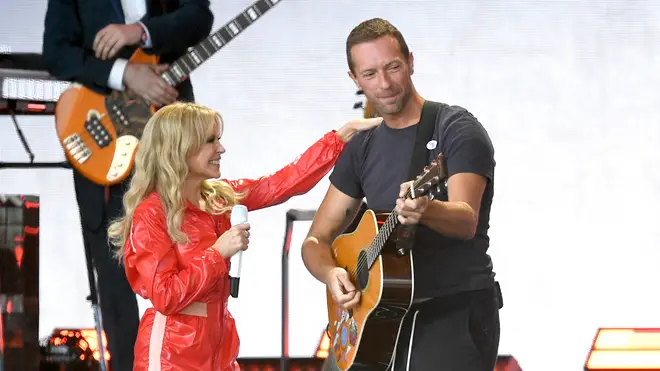 Kylie Minogue and Chris Martin perform on the Pyramid stage during day five of Glastonbury