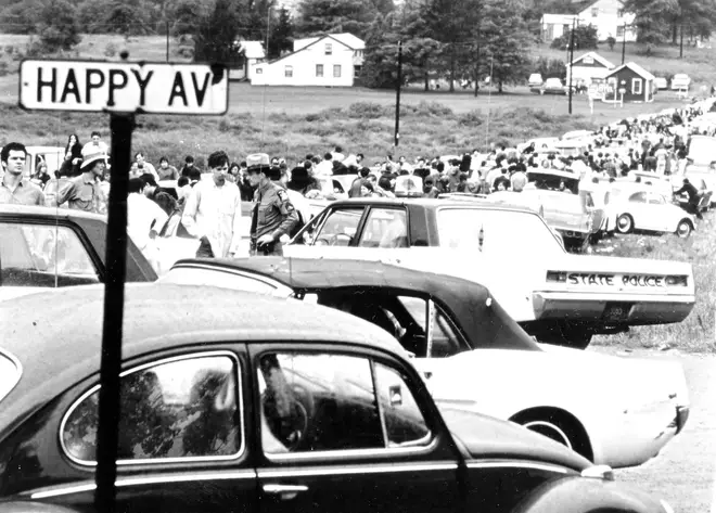 The crowd heading towards the festival site at Woodstock in August 1969