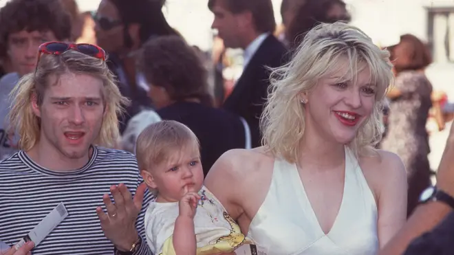 Kurt Cobain and Courtney Love with their daughter Frances Bean outside the 1993 MTV Video Music Awards