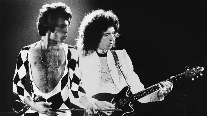 The late Freddie Mercury and Brian May of Queen perform in 1987