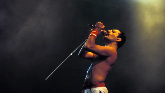 Freddie Mercury performing live at Wembley Stadium in 1986