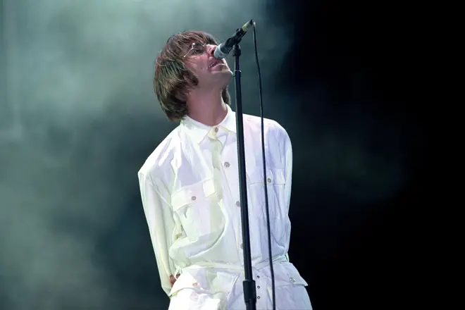 Liam Gallagher performing with Oasis at Knebworth, 1996