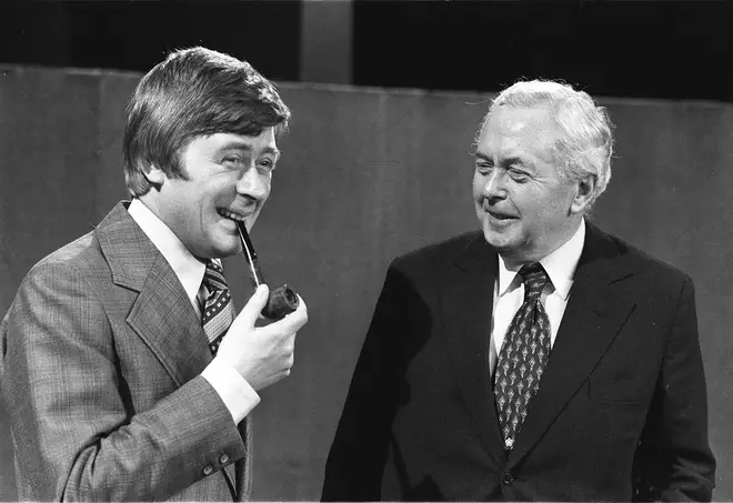 Mike Yarwood does his impersonation of Prime Minister Harold Wilson in front of the real thing, 1977