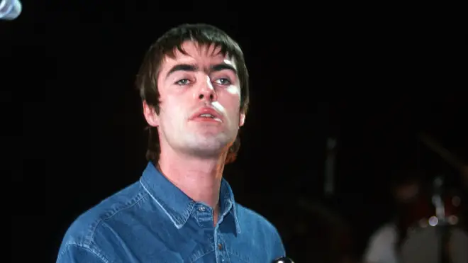 Liam Gallagher performs with Oasis in 1997