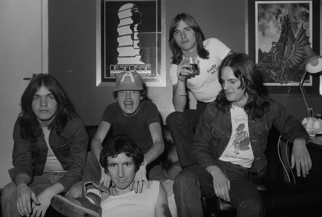 The Bon Scott line-up of AC/DC in 1976:  Malcolm Young, Bon Scott, Angus Young, Phil Rudd and Mark Evans.
