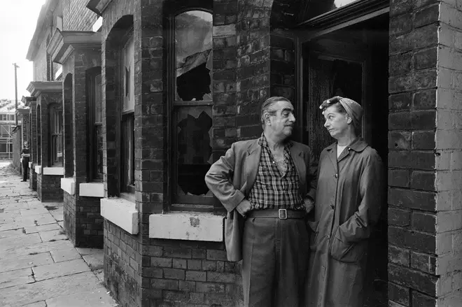 Bernard Youens and Jean Alexander aka Stan and Hild Ogden visit Archie Street shortly before it was demolished in August 1971. Archie Street was the basis for the fictional Coronation Street.