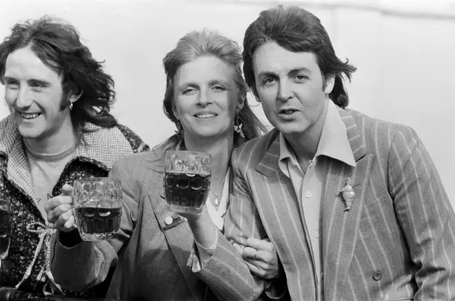 Denny Laine promoting Wings' London Town album with Paul and Linda McCartney in March 1978.