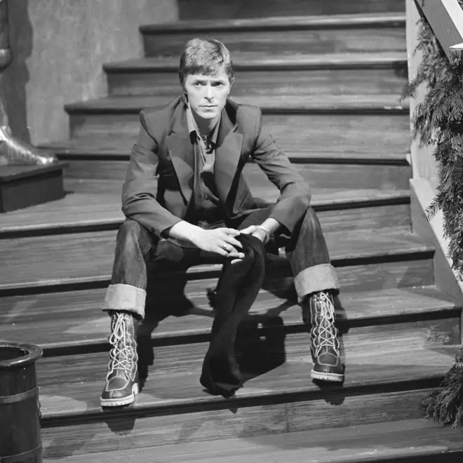 David Bowie wonders what he's got himself into; on the set of Bing Crosby's Merrie Olde Christmas, Elstree Studios. 11th September 1977