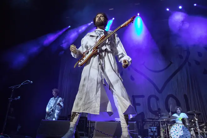 Kasabian performing live in 2017