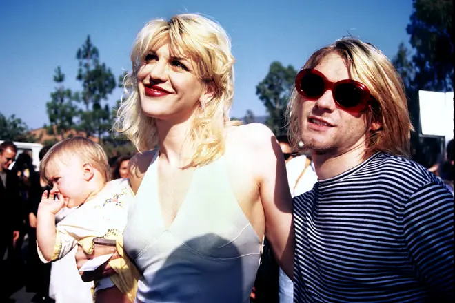 Kurt Cobain, Courtney Love and baby Frances Bean attending the 1993 MTV Music Video Awards.