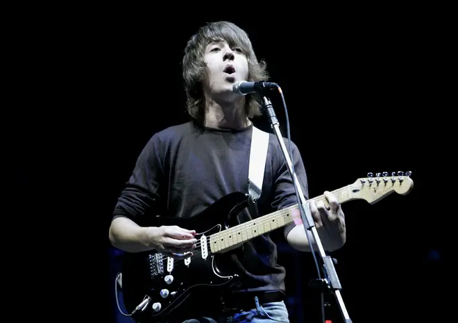 Alex Turner performing with Arctic Monkeys at Reading 2006