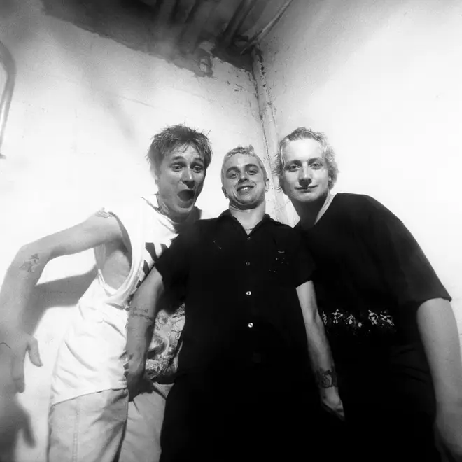 Green Day pose for a July 1994 portrait at Lallapalooza in New York City