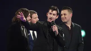 Alex Turner and his fellow Monkeys at the BRIT Awards, 19th February 2014