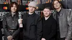 Oliver Sykes, Matt Nicholls, Lee Malia and Matt Kean of Bring me the Horizon pose with their Alternative/Rock Act award during the BRIT Awards 2024.