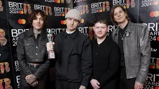 Oliver Sykes, Matt Nicholls, Lee Malia and Matt Kean of Bring me the Horizon pose with their Alternative/Rock Act award during the BRIT Awards 2024.