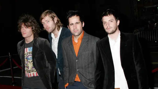 The Killers in November 2004: David Keuning, Mark Stoermer, Ronnie Vannucci and Brandon Flowers.