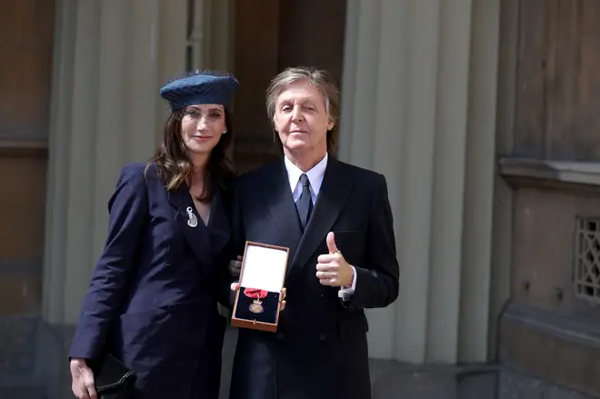 Sir Paul McCartney and his wife Nancy Shevell following an Investiture ceremony, where he was made a Companion of Honour at Buckingham Palace on May 4, 2018