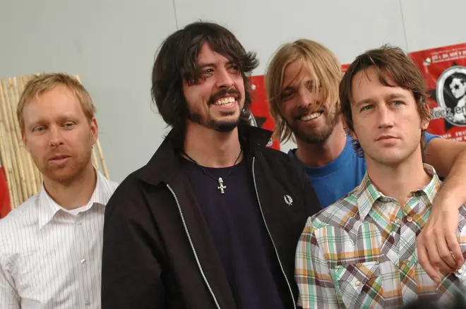 Foo Fighters at Rock en Seine in August 2004: Foo Fighters in 2005: Nate Mendel, Dave Grohl, Taylor Hawkins, Chris Shiflett.