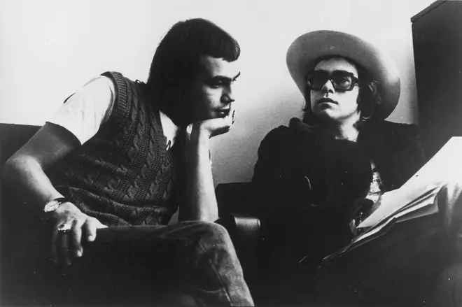 Elton John and his lyricist Bernie Taupin pose for a portrait in circa 1971